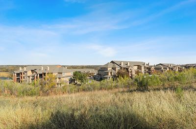 Exterior grassy hill at Cypress View Villas in Weatherford TX